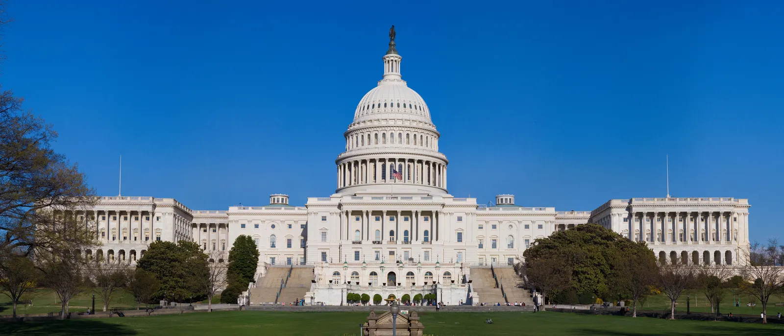 The United States Capitol and its dome under a clear sky
